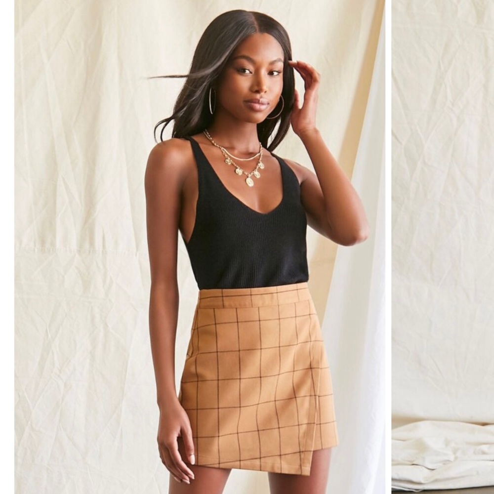 Forever 21 woven mini skirt featuring a grid print, mock wrap